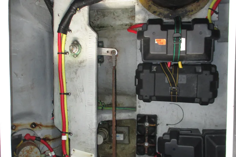 New Lease On Life Yacht Photos Pics 2004 Meridian 340 engine compartment with wiring and battery boxes.