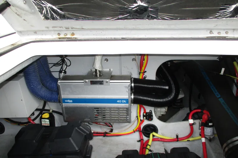 New Lease On Life Yacht Photos Pics Engine compartment of a 2004 Meridian 340 boat with Wallas 40 Dt heater system.