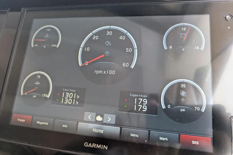  Yacht Photos Pics Garmin display on 2020 Regal 38 Grande Coupe showing engine metrics and gauges.