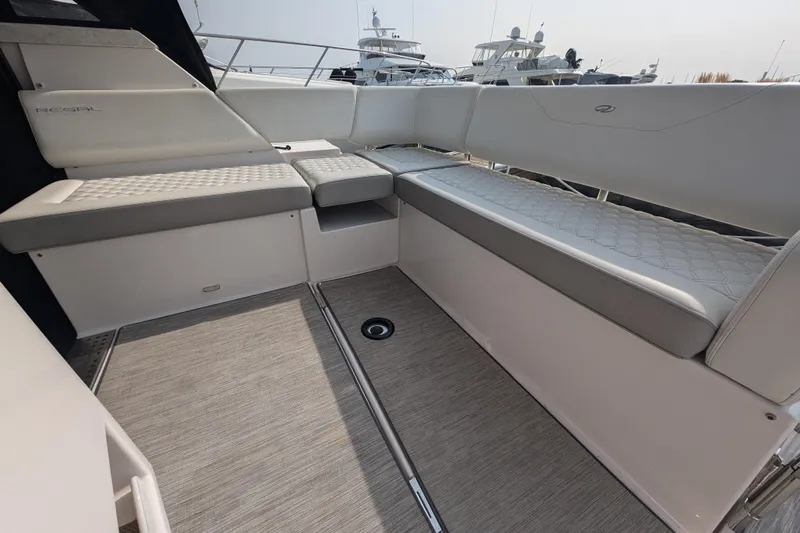  Yacht Photos Pics 2020 Regal 38 Grande Coupe interior seating area with modern design and comfortable upholstery.