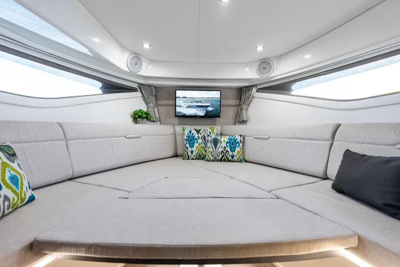 Swelltimes IV Yacht Photos Pics Luxurious interior of 2022 Sea Ray Sundancer 320 OB with modern seating and decor.