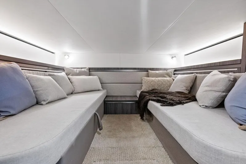 Swelltimes IV Yacht Photos Pics Luxurious interior of 2022 Sea Ray Sundancer 320 OB with plush seating and modern design.