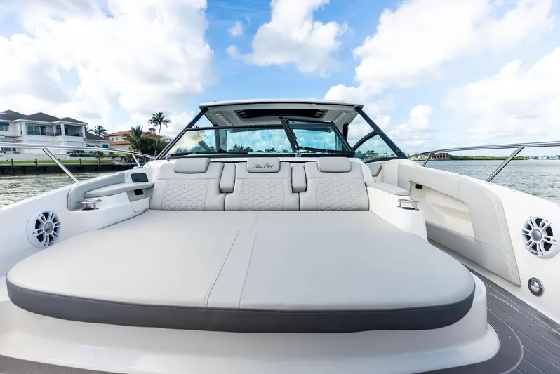 Swelltimes IV Yacht Photos Pics 2022 Sea Ray Sundancer 320 OB boat with spacious deck and luxurious seating.