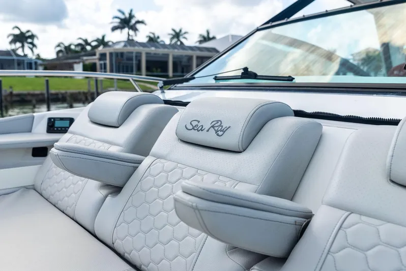 Swelltimes IV Yacht Photos Pics 2022 Sea Ray Sundancer 320 OB boat with luxurious seating and armrests.