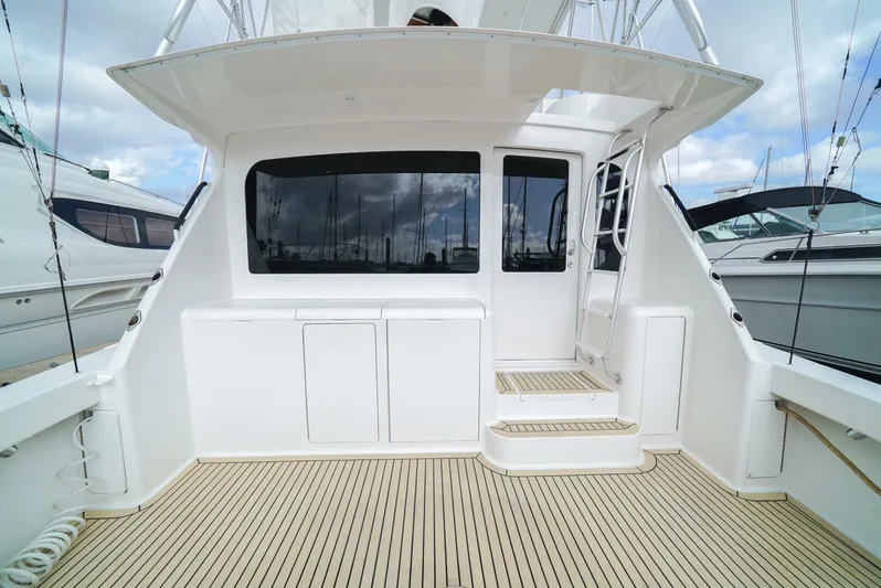 Bad Habits Yacht Photos Pics 2007 Viking 45 Convertible yacht with spacious deck and sleek design.