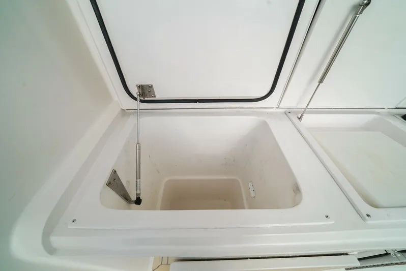 Bad Habits Yacht Photos Pics Open storage compartment on 2007 Viking 45 Convertible boat.