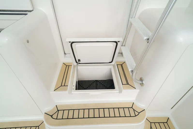 Bad Habits Yacht Photos Pics 2007 Viking 45 Convertible boat interior with open hatch and ladder.