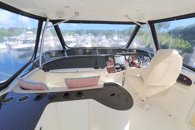 Family Time Yacht Photos Pics 2013 Meridian 441 Sedan helm with panoramic marina view.