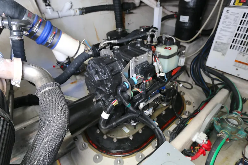 Family Time Yacht Photos Pics Engine room of 2013 Meridian 441 Sedan with visible mechanical components.