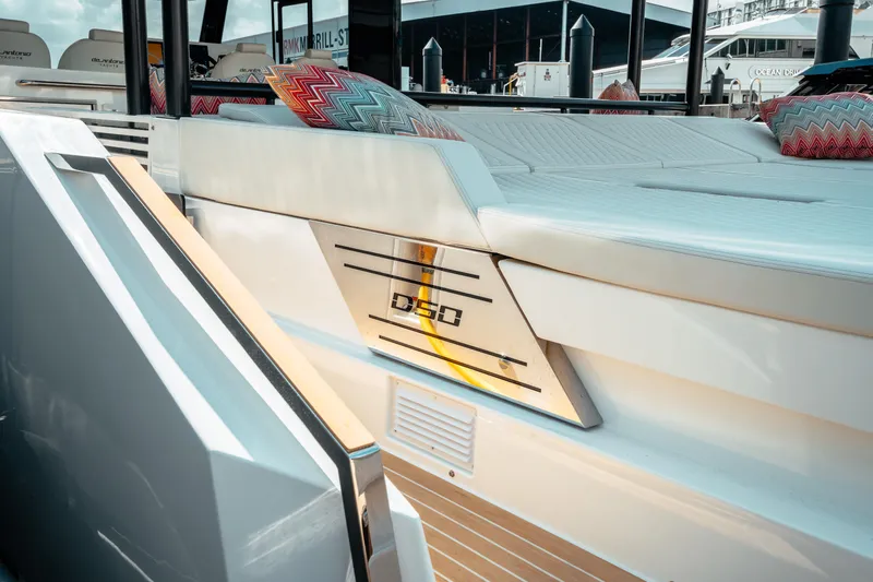  Yacht Photos Pics 2025 De Antonio Yachts D50 Coupé, luxury yacht deck with modern design and comfortable seating.