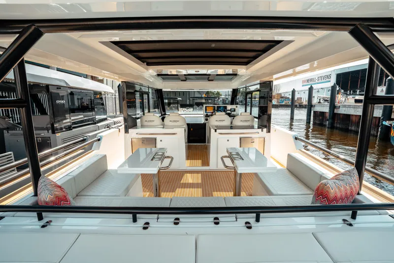  Yacht Photos Pics 2025 De Antonio Yachts D50 Coupé interior with modern seating and sleek design.