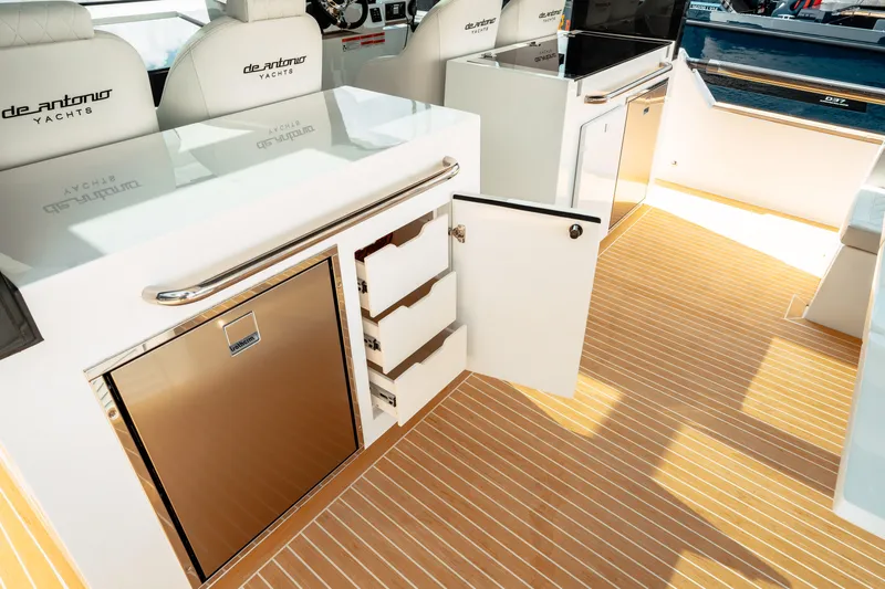  Yacht Photos Pics 2025 De Antonio Yachts D50 Coupé interior with sleek cabinetry and modern design.