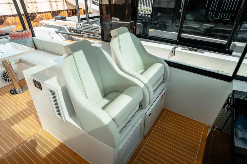  Yacht Photos Pics Luxurious interior of 2025 De Antonio Yachts D50 Coupé with elegant seating and modern design.