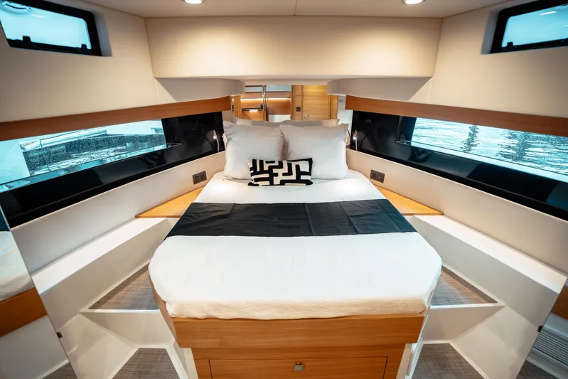  Yacht Photos Pics Luxurious interior of 2025 De Antonio Yachts D50 Coupé with modern bedroom design.