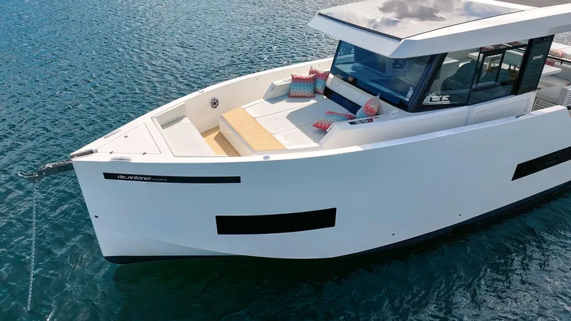 Yacht Photos Pics 2025 De Antonio Yachts D50 Coupé on water, showcasing sleek design and modern features.