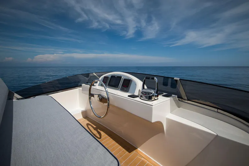 36 Fly Yacht Photos Pics 2025 Toy 36 Fly yacht helm with ocean view and clear sky.