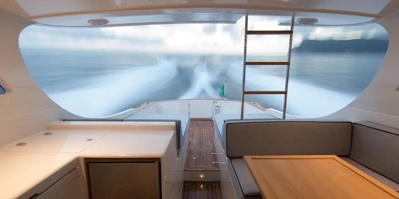 36 Fly Yacht Photos Pics Interior view of 2025 Toy 36 Fly yacht, featuring sleek design and ocean backdrop.