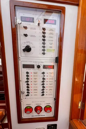 Indigo Yacht Photos Pics Electrical control panel on a 2007 Bruckmann 34e boat, featuring switches and gauges.
