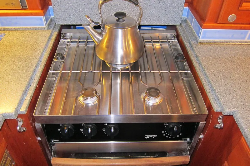 Dreamwalker Yacht Photos Pics Stainless steel stove with kettle on Gozzard 41B yacht, 2008 model.