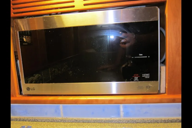 Dreamwalker Yacht Photos Pics Built-in LG microwave in a 2008 Gozzard 41B yacht kitchen.