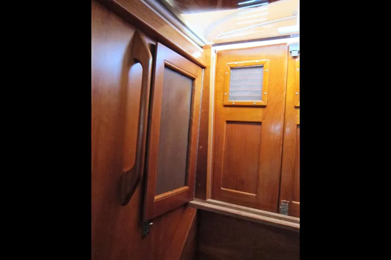 Dreamwalker Yacht Photos Pics Interior of 2008 Gozzard 41B sailboat with polished wooden cabinetry.