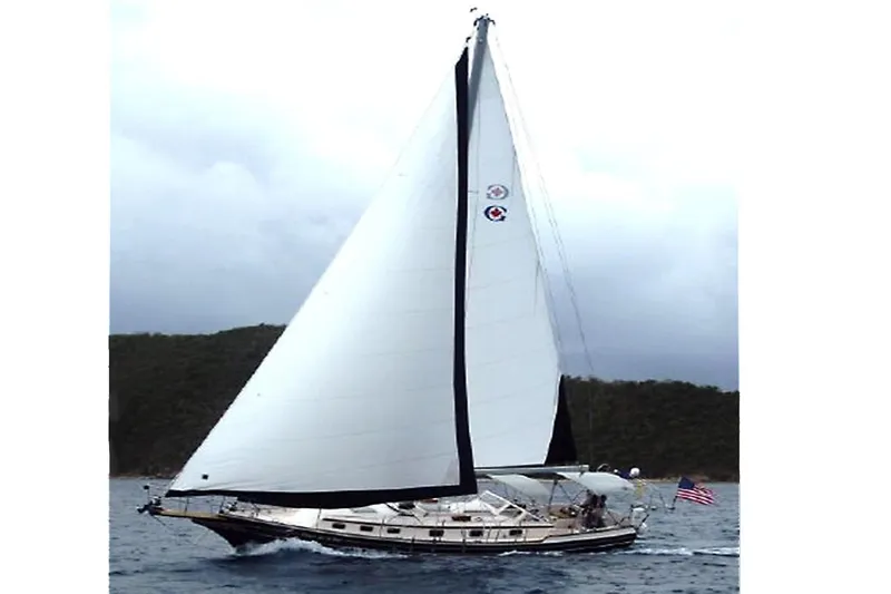 Dreamwalker Yacht Photos Pics Sailing yacht Gozzard 41B, 2008 model, cruising on open water with full sails.