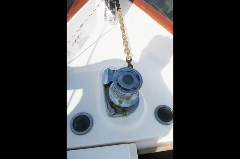Dreamwalker Yacht Photos Pics Anchor windlass on 2008 Gozzard 41B sailboat deck with chain and rope.