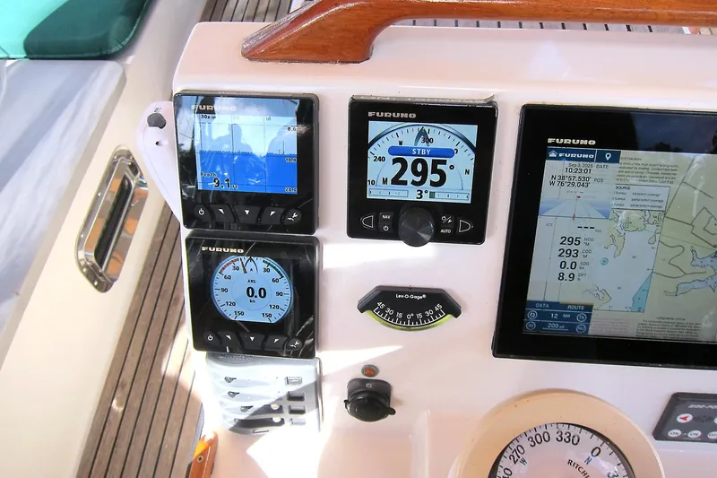 Dreamwalker Yacht Photos Pics Navigation instruments on a 2008 Gozzard 41B yacht dashboard, featuring Furuno displays.