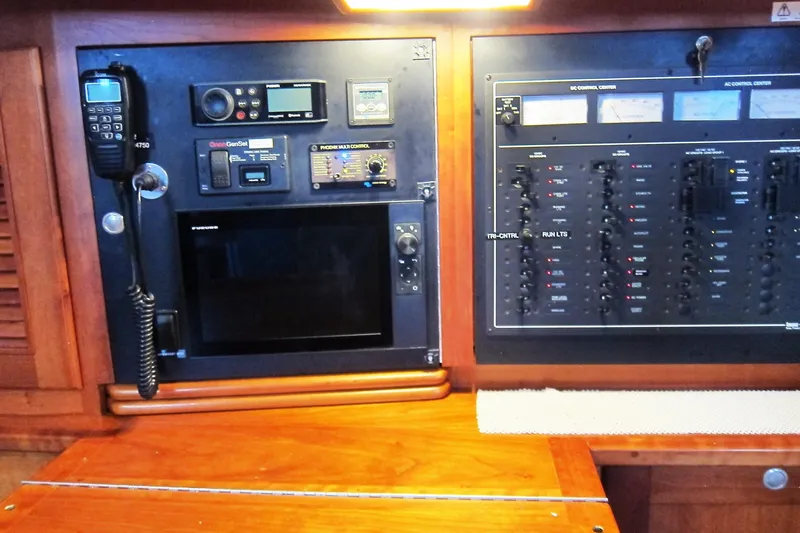 Dreamwalker Yacht Photos Pics Control panel of a 2008 Gozzard 41B yacht with communication and navigation equipment.