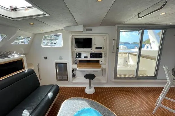 Knot Bad! Yacht Photos Pics Interior of 2008 Voyage Yachts 500 with modern amenities and outdoor view.