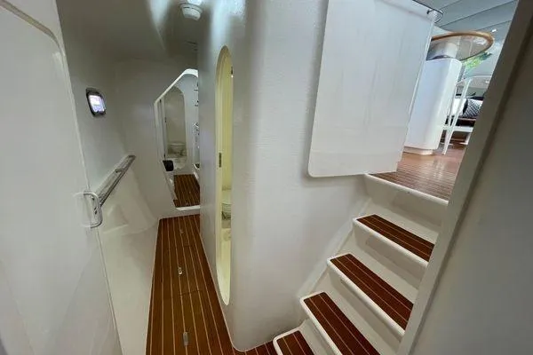 Knot Bad! Yacht Photos Pics Interior of 2008 Voyage Yachts 500, featuring wooden flooring and white walls.