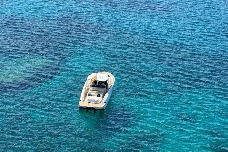 Esimar Yacht Photos Pics 2023 Solaris Power 40 Open yacht on clear blue water.