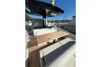 2023 Solaris Power 40 Open yacht with elegant seating and wooden table on deck.