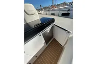 2023 Solaris Power 40 Open yacht interior with open storage compartment.