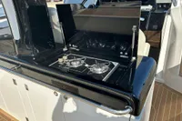 Outdoor kitchen on 2023 Solaris Power 40 Open yacht with dual gas burners.