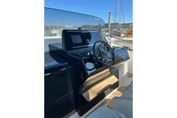 Helm of 2023 Solaris Power 40 Open yacht with sleek design and modern controls.