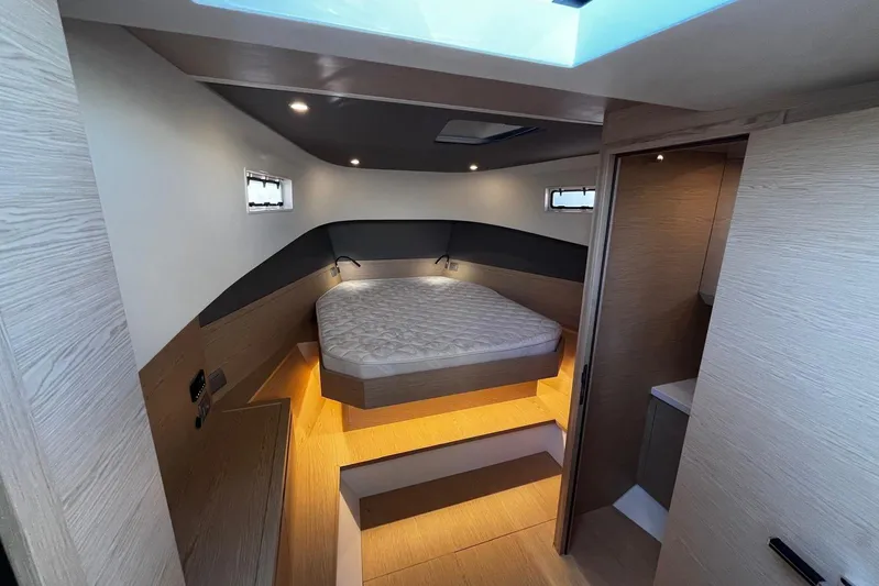 Esimar Yacht Photos Pics Luxurious cabin interior of 2023 Solaris Power 40 Open yacht with modern design.