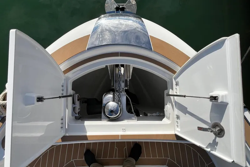 Esimar Yacht Photos Pics 2023 Solaris Power 40 Open yacht anchor compartment with open hatches, showcasing sleek design.