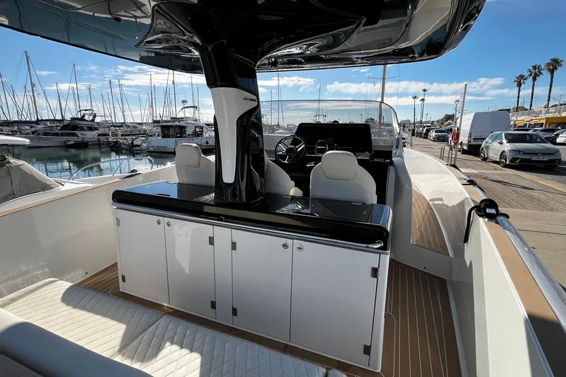 Esimar Yacht Photos Pics 2023 Solaris Power 40 Open yacht interior at marina, showcasing sleek design and modern amenities.