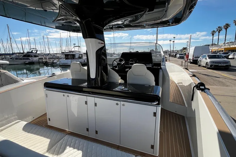 Esimar Yacht Photos Pics 2023 Solaris Power 40 Open yacht interior at marina, showcasing sleek design and modern amenities.