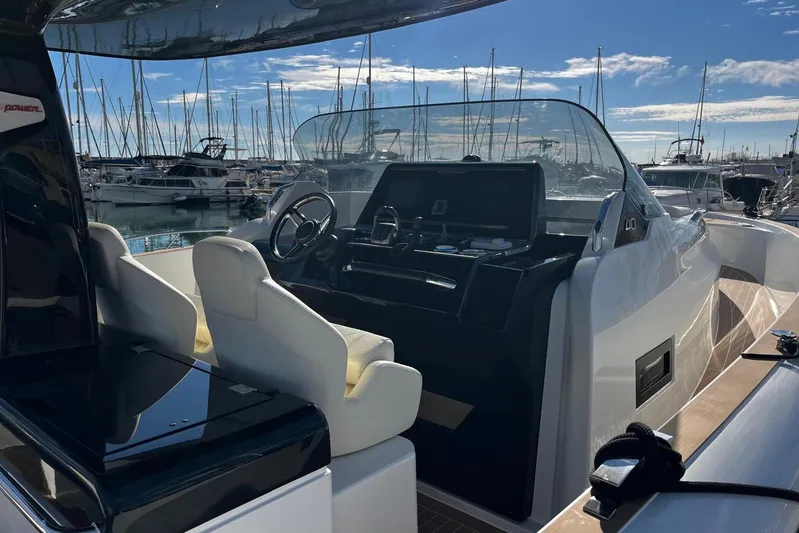 Esimar Yacht Photos Pics 2023 Solaris Power 40 Open yacht interior with sleek design and modern controls.