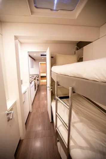Sicilian Breeze Yacht Photos Pics Interior of 2021 Lagoon Seventy 7 yacht with bunk beds and modern design.