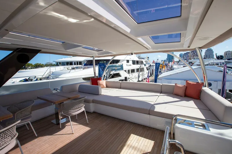 Sicilian Breeze Yacht Photos Pics Luxurious 2021 Lagoon Seventy 7 yacht interior with spacious seating and modern design.