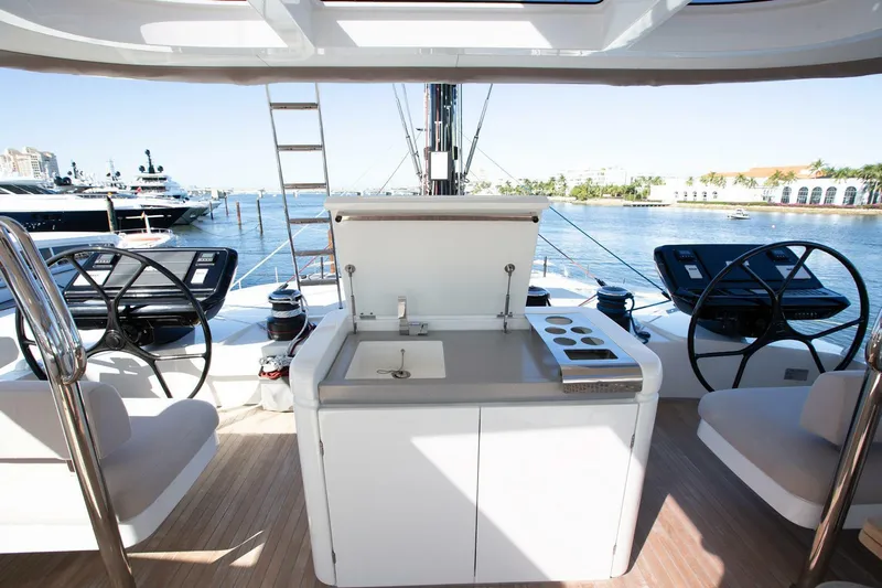 Sicilian Breeze Yacht Photos Pics Luxury Lagoon Seventy 7 yacht deck with outdoor kitchen, 2021 model.