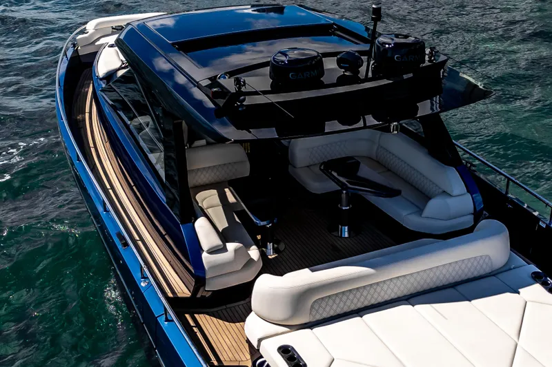  Yacht Photos Pics Luxurious 2025 Dutch American DA 53 yacht with elegant seating on open water.