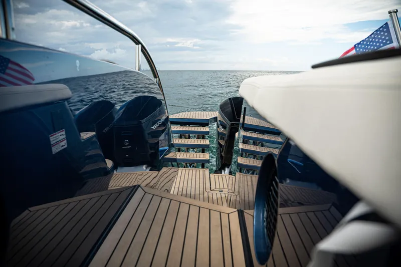  Yacht Photos Pics Sleek 2025 Dutch American DA 53 yacht with wooden deck and ocean view.