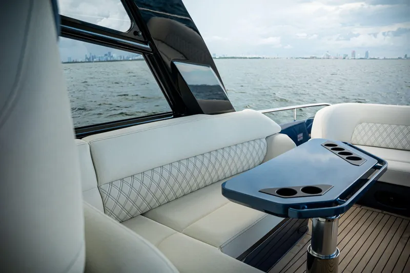  Yacht Photos Pics Luxurious interior of 2025 Dutch American DA 53 yacht with elegant seating and table.