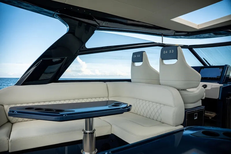  Yacht Photos Pics Luxurious interior of 2025 Dutch American DA 53 yacht with elegant seating and ocean view.