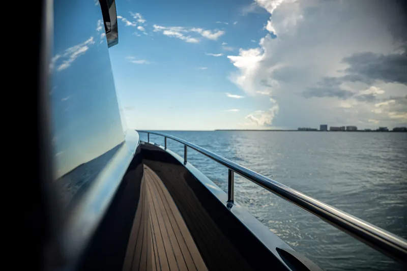  Yacht Photos Pics Side view of Dutch American DA 53 yacht cruising on open water, 2025 model.