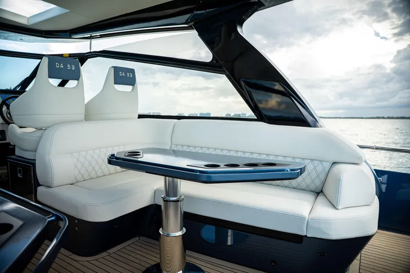  Yacht Photos Pics Luxurious interior of 2025 Dutch American DA 53 yacht with elegant seating and table.